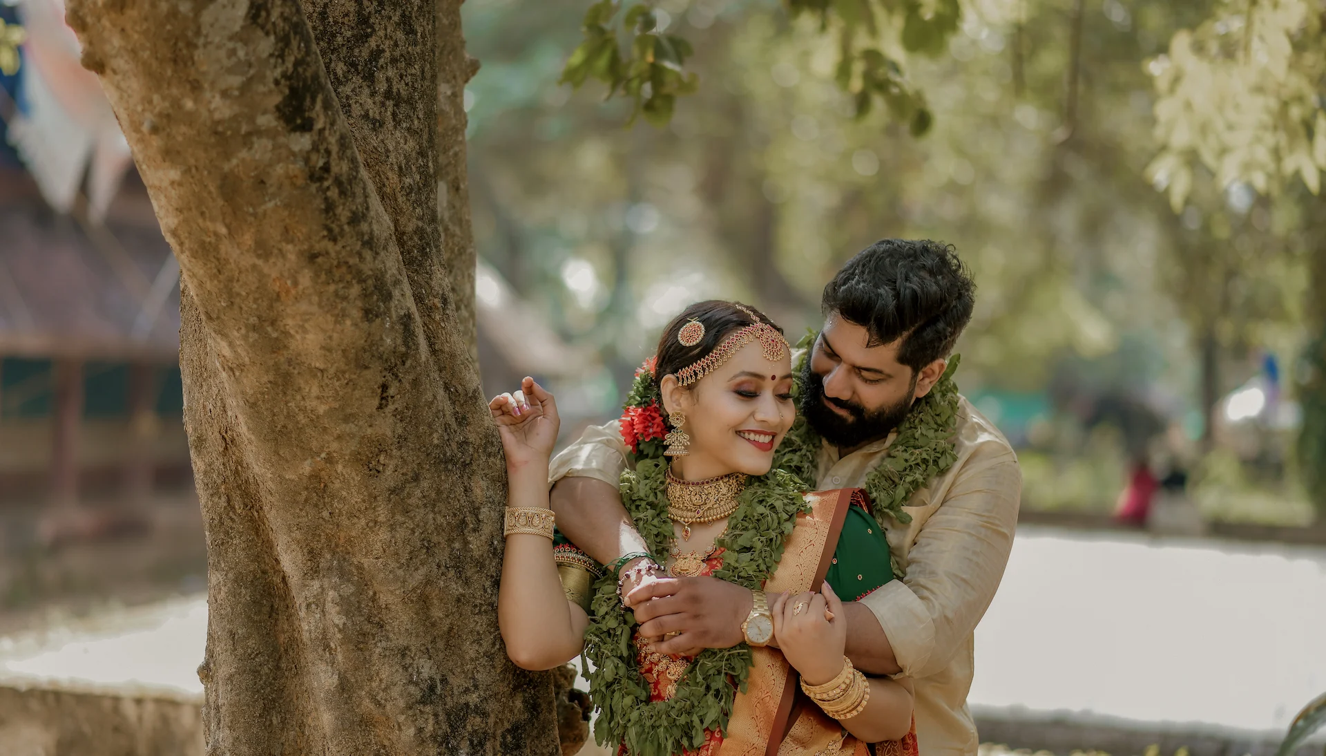 A happy couple at their wedding, captured by Daze Photography in Guruvayur